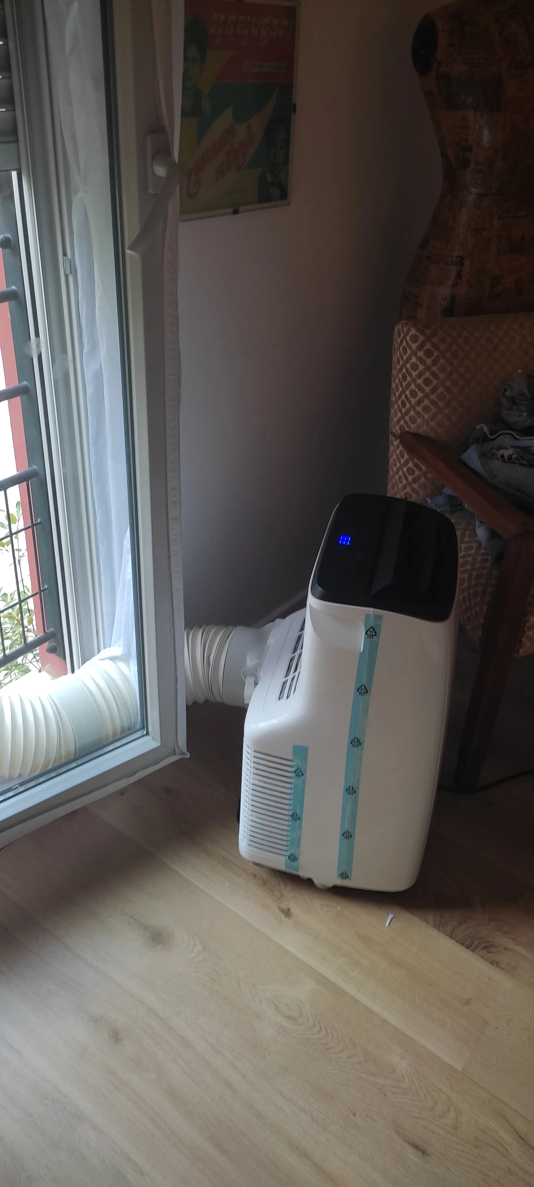 Climatiseur mobile installé dans un logement à Bron